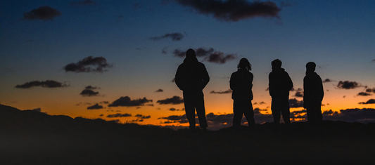what is clean cider? Group of friends against a sunset
